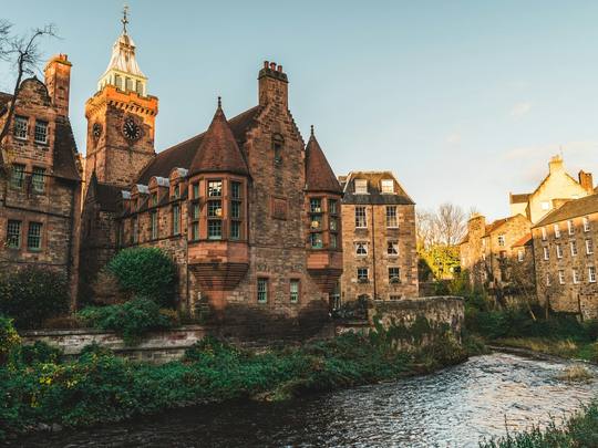The old stone buildings of Dean Village beside the river