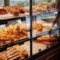 Pastries and sausage rolls in a glass counter