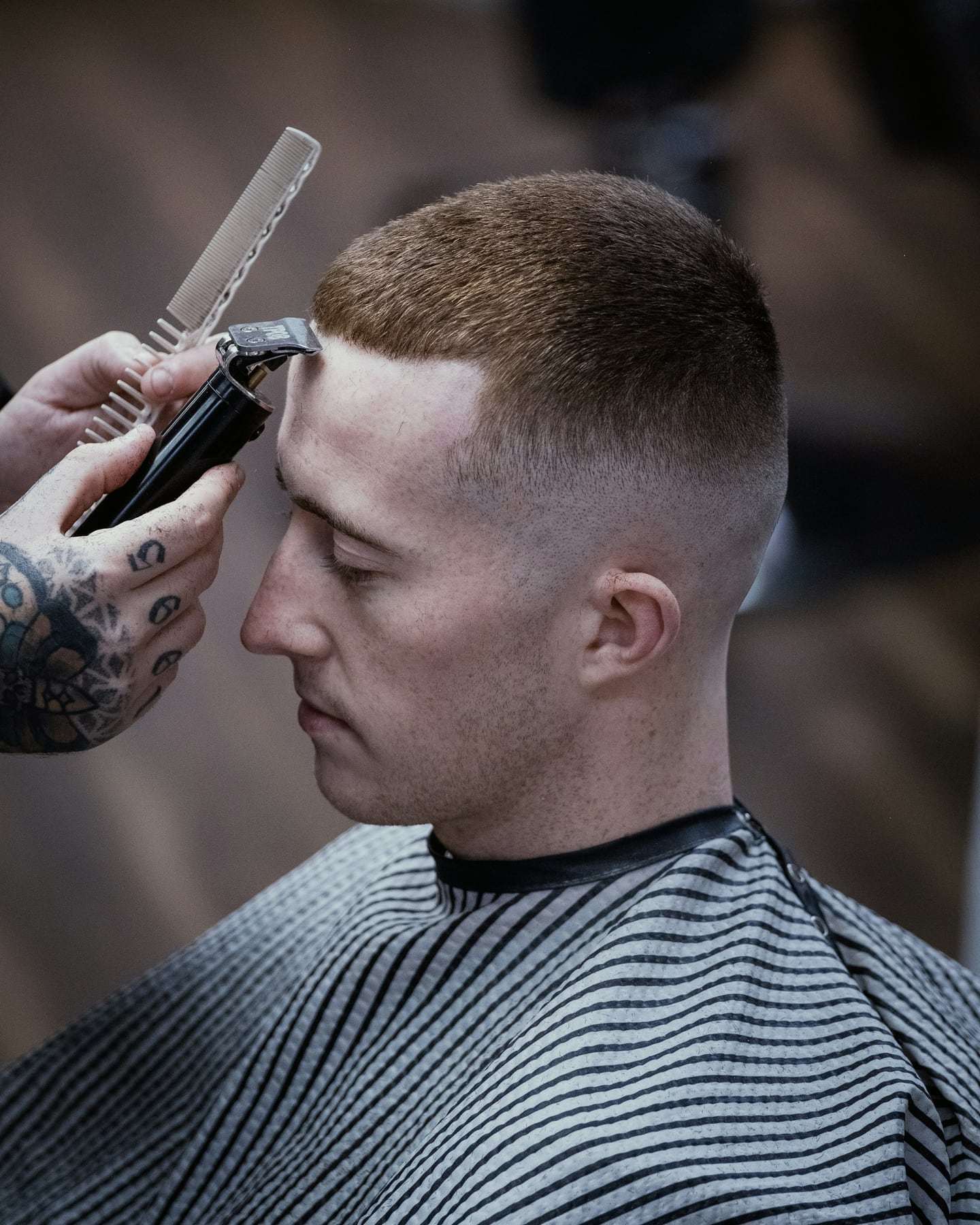 A clean skin fade with a short textured top