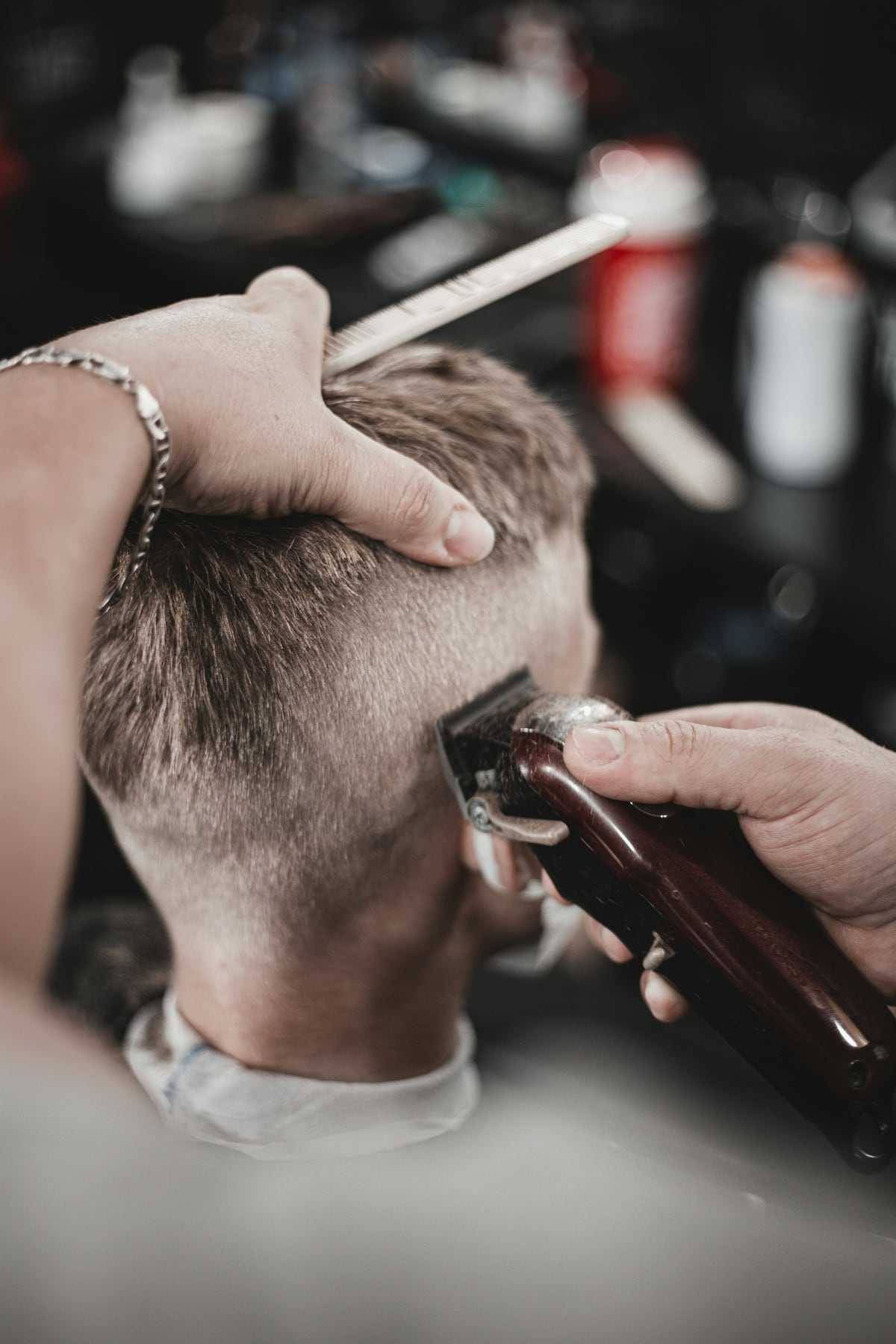Clippers working a fade up the back of the head