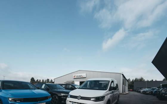 Cars on the forecourt outside the showroom