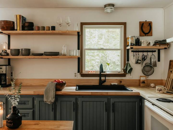 A tidy cottage kitchen ready for guests