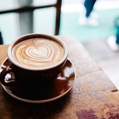 A latte with a heart poured on top