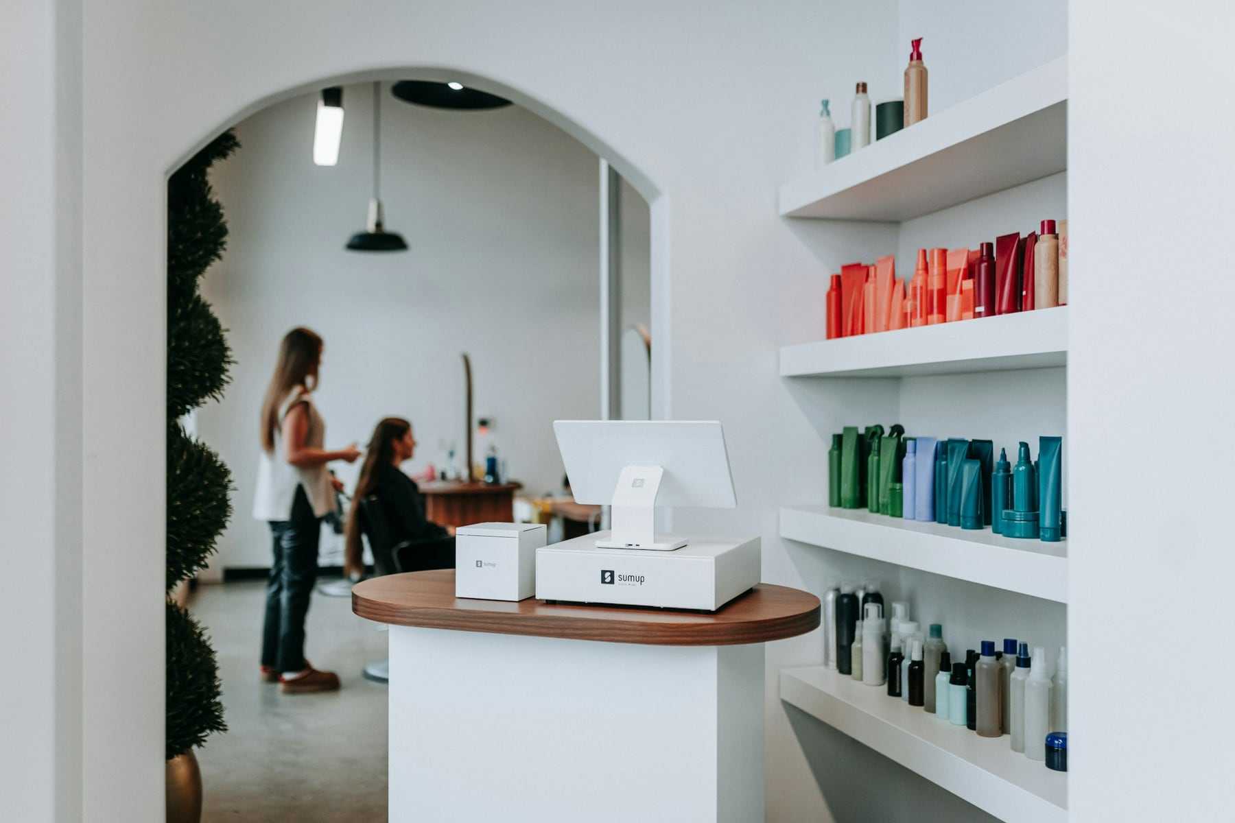 The reception desk and product shelves