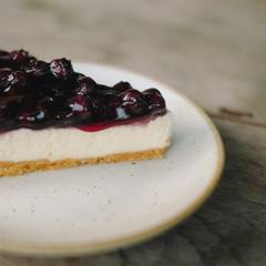A slice of blueberry cheesecake